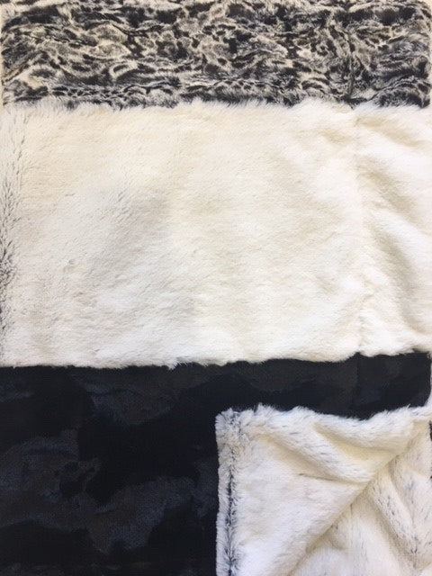 Luxe Cuddle Caviar Hide, Black Frost and Spot Leopard Snuggle Black Strip on Luxe Cuddle Black Frost