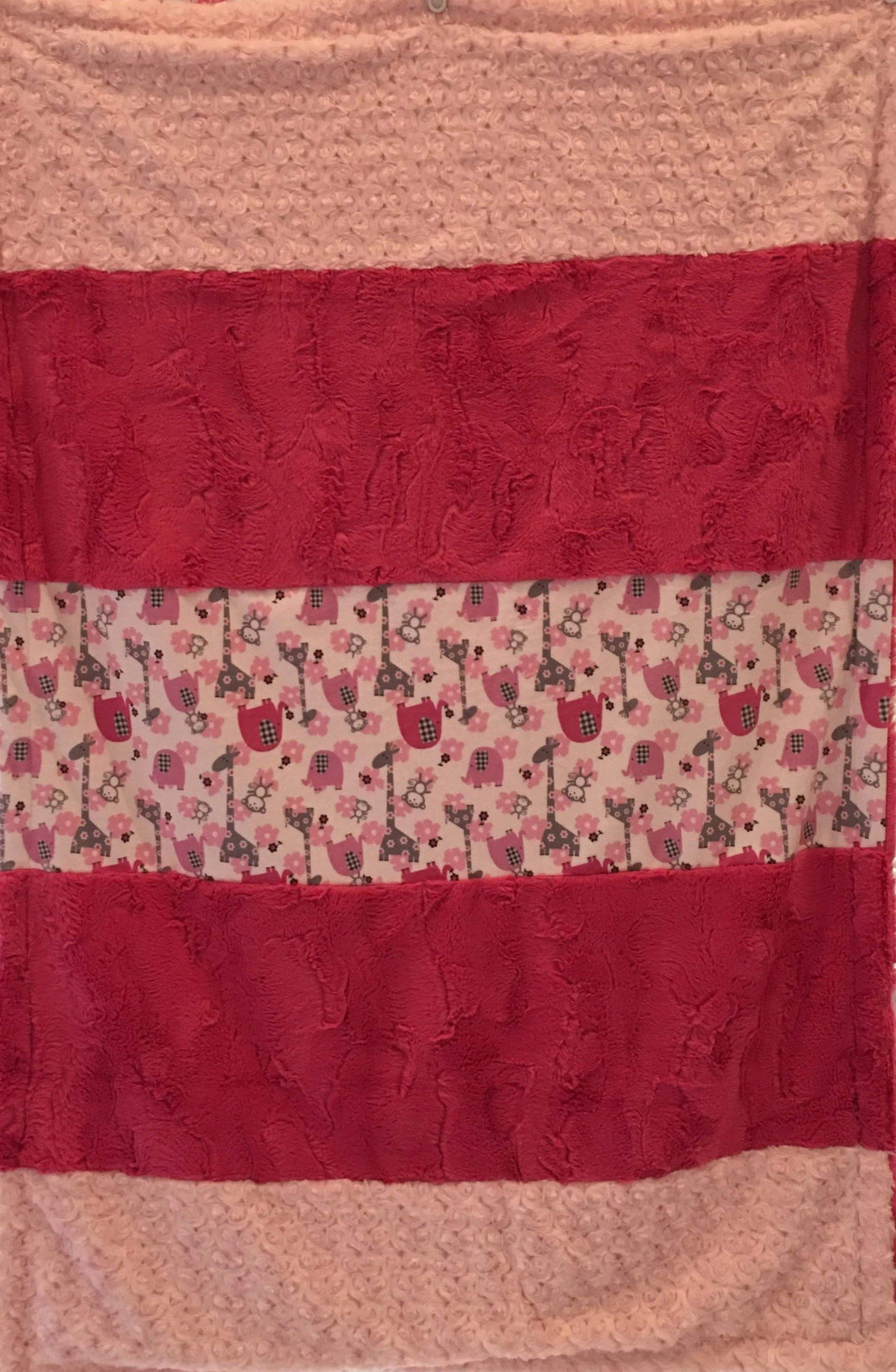 Jungle Dreams in Fuschia and Luxe Cuddle Rosettes in Ice Pink Strip on Luxe Cuddle Carnation Hide