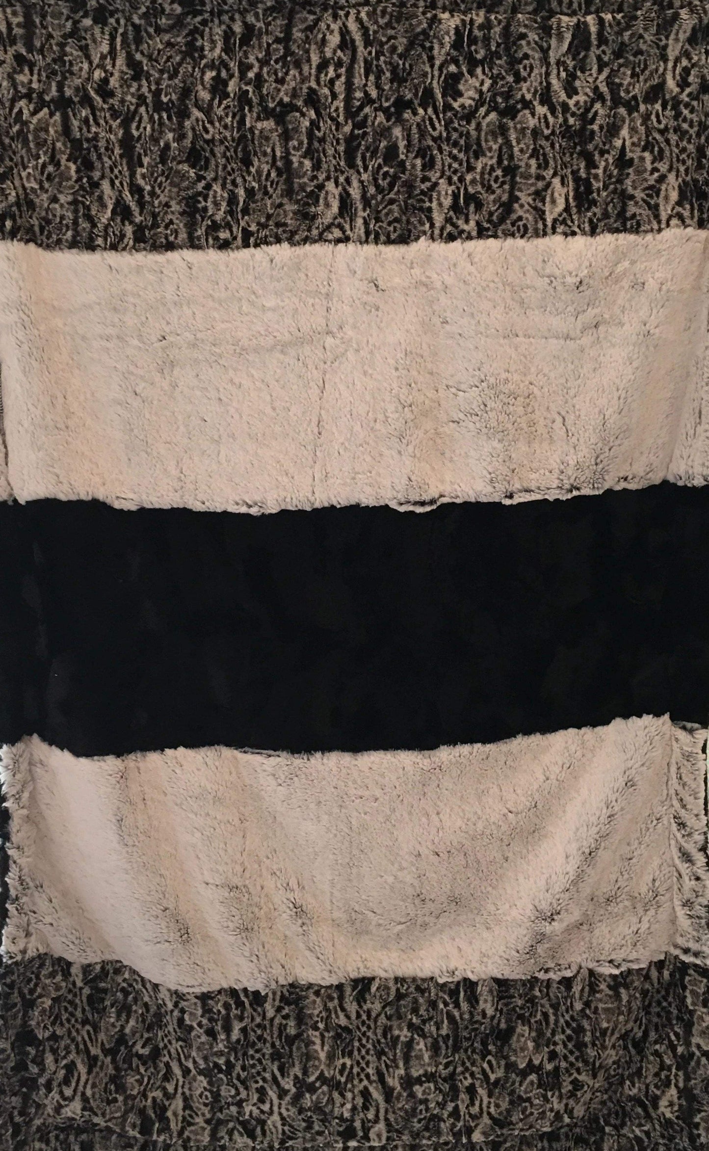 Spot Leopard Snuggle Black Strip on Luxe Cuddle Caviar Hide
