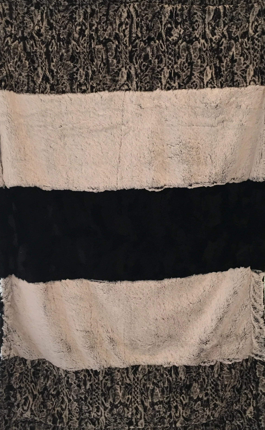 Spot Leopard Snuggle Black Strip on Luxe Cuddle Caviar Hide