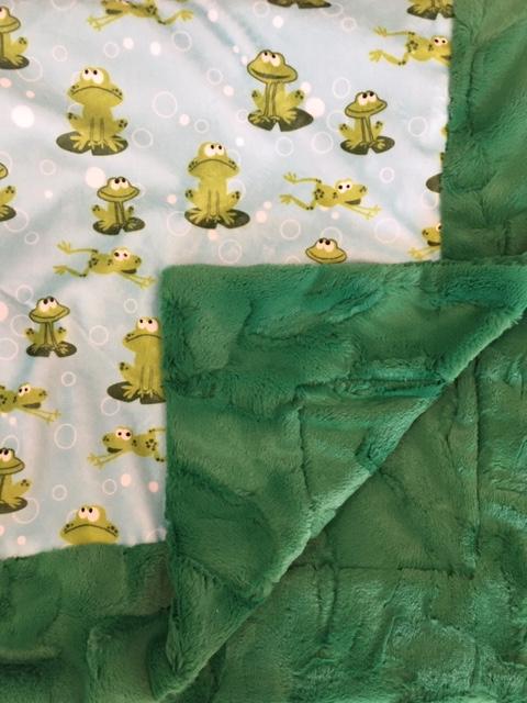 Baby Blanket Bordered and Backed in Luxe Cuddle Kelly Hide on Spoonflower's Froggy in Kiwi