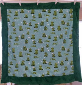 Baby Blanket Bordered and Backed in Luxe Cuddle Kelly Hide on Spoonflower's Froggy in Kiwi